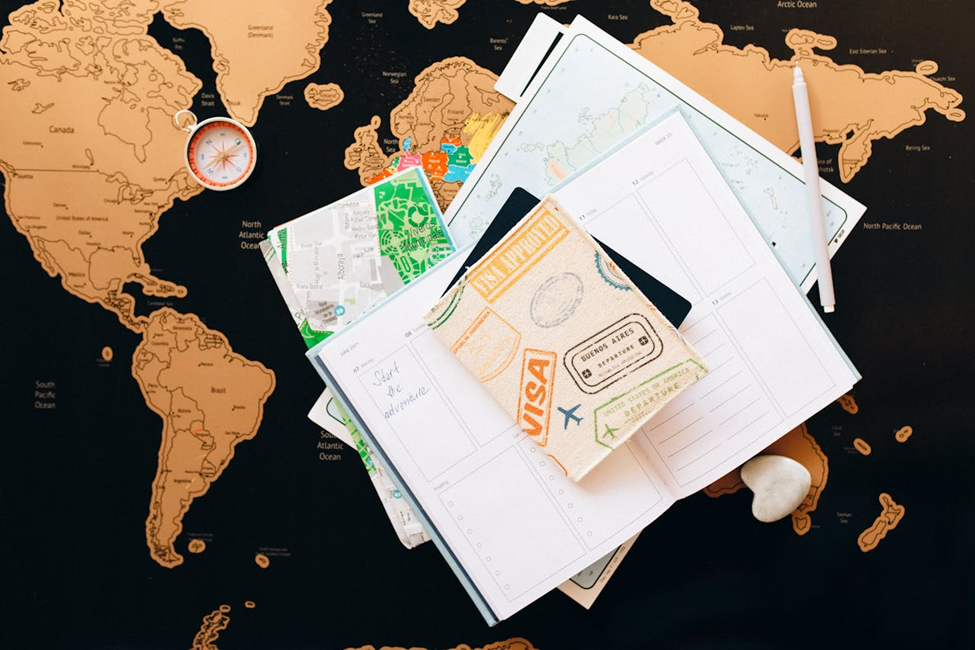 Passport on top of a world map